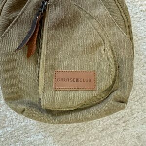 Khaki sling bag with adjustable straps